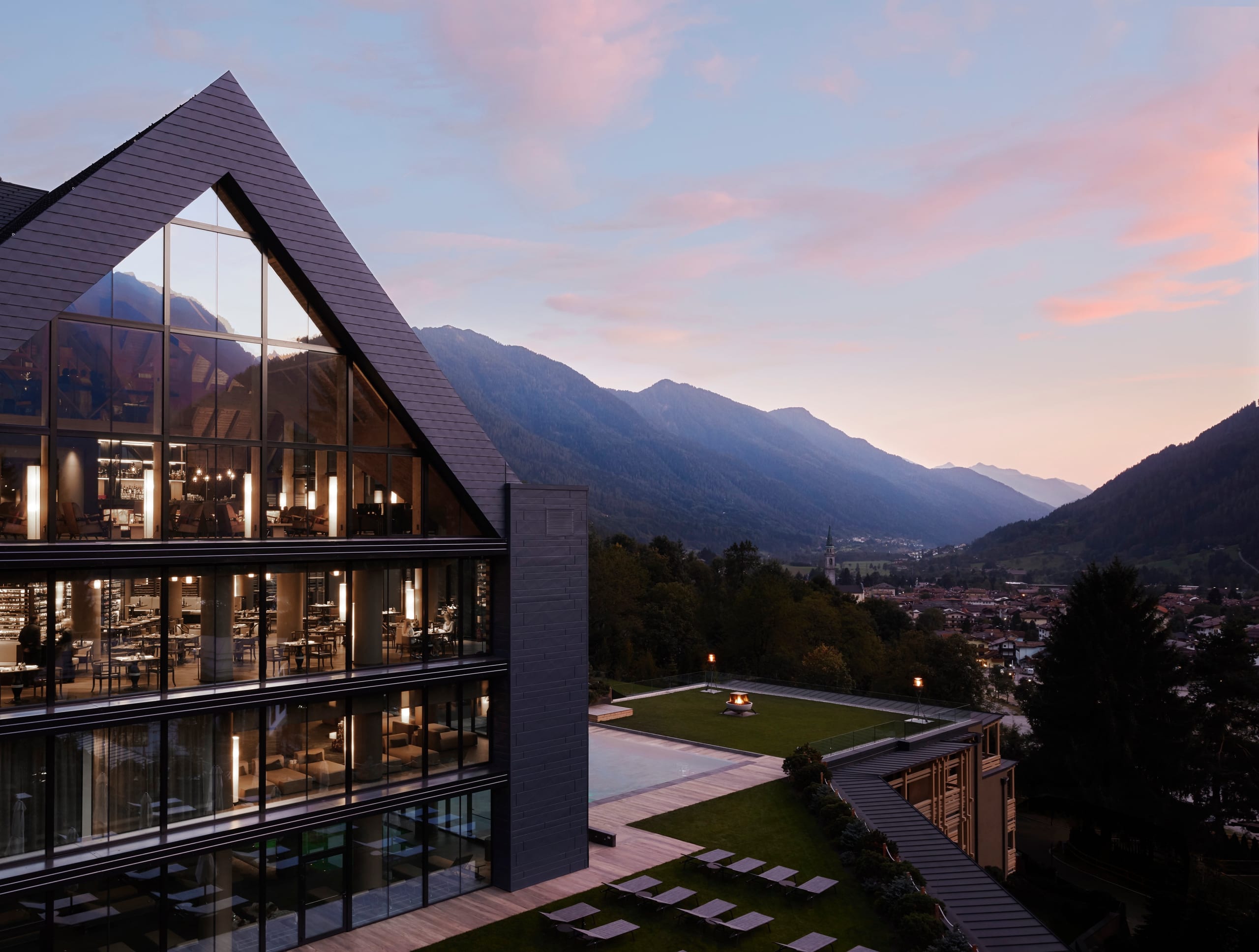 Sunset view over Pinzolo from Lefay Dolomiti with mountains in the background