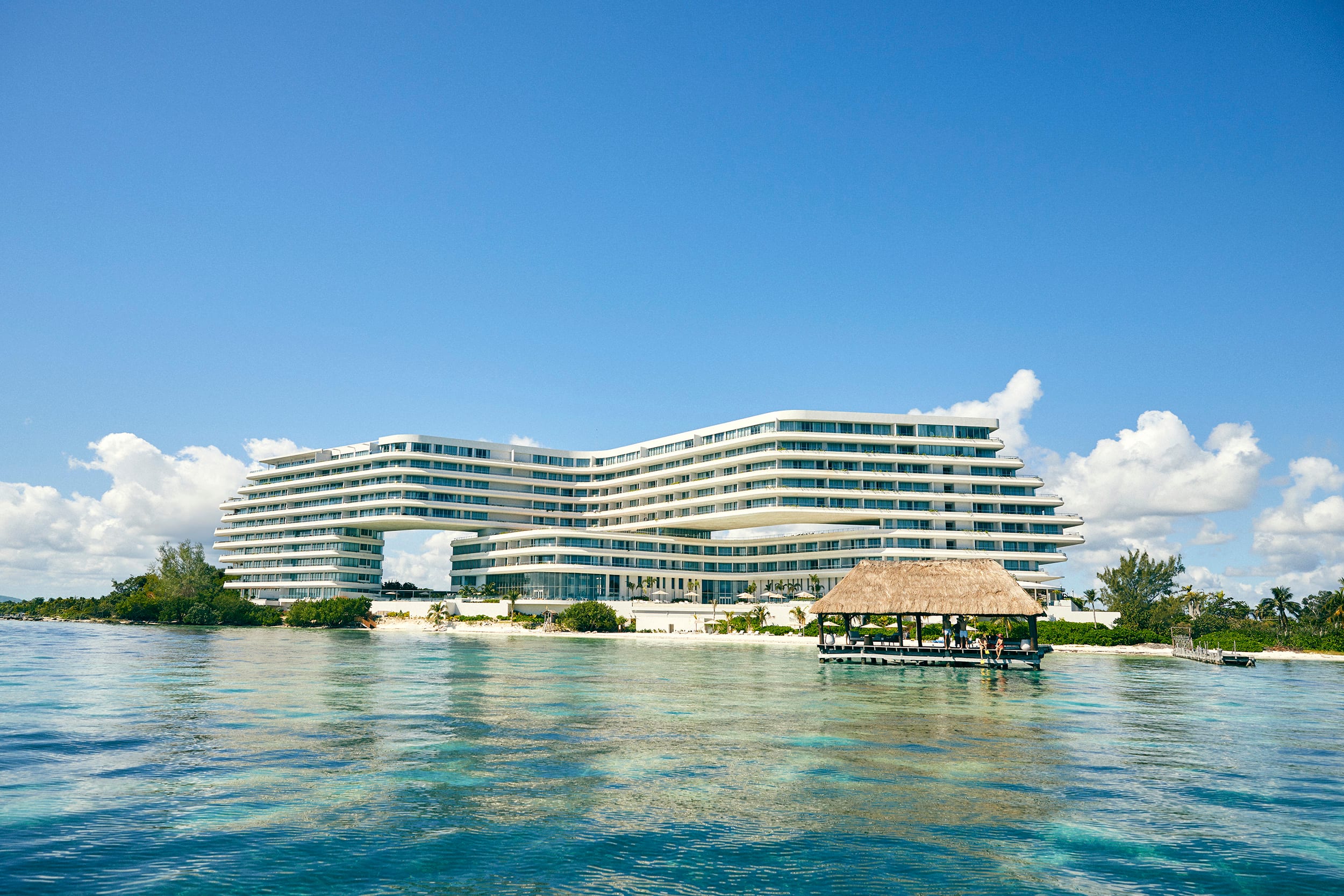 View from the sea of SHA Wellness Clinic Mexico with the pier in the foreground