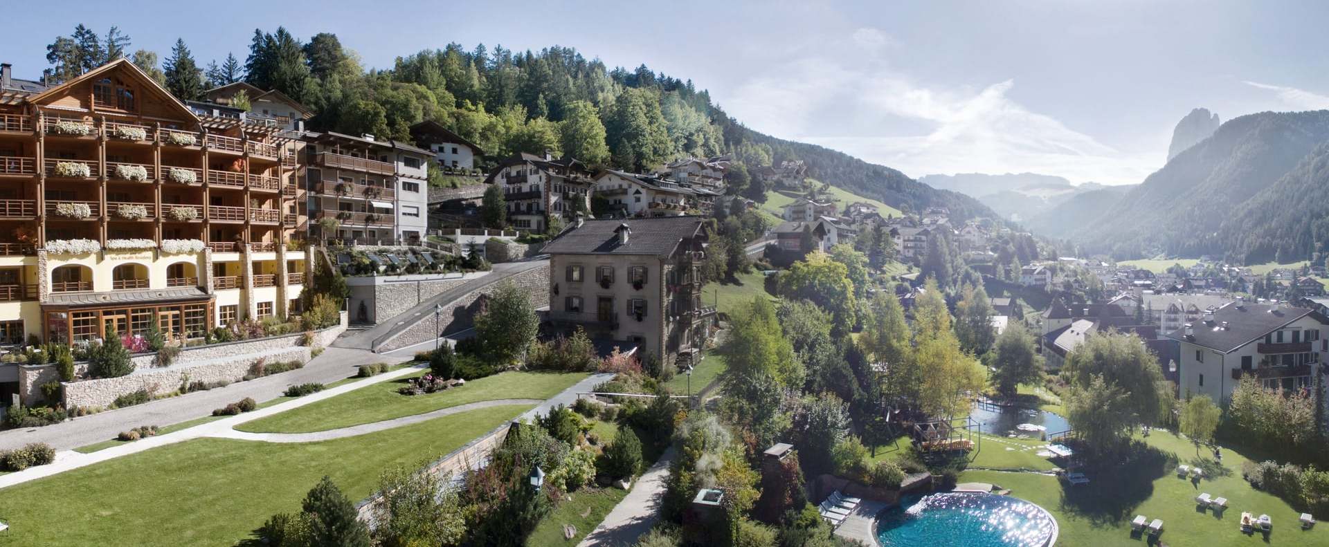 Adler Balance resort exterior surrounded by the Dolomites, Ortisei