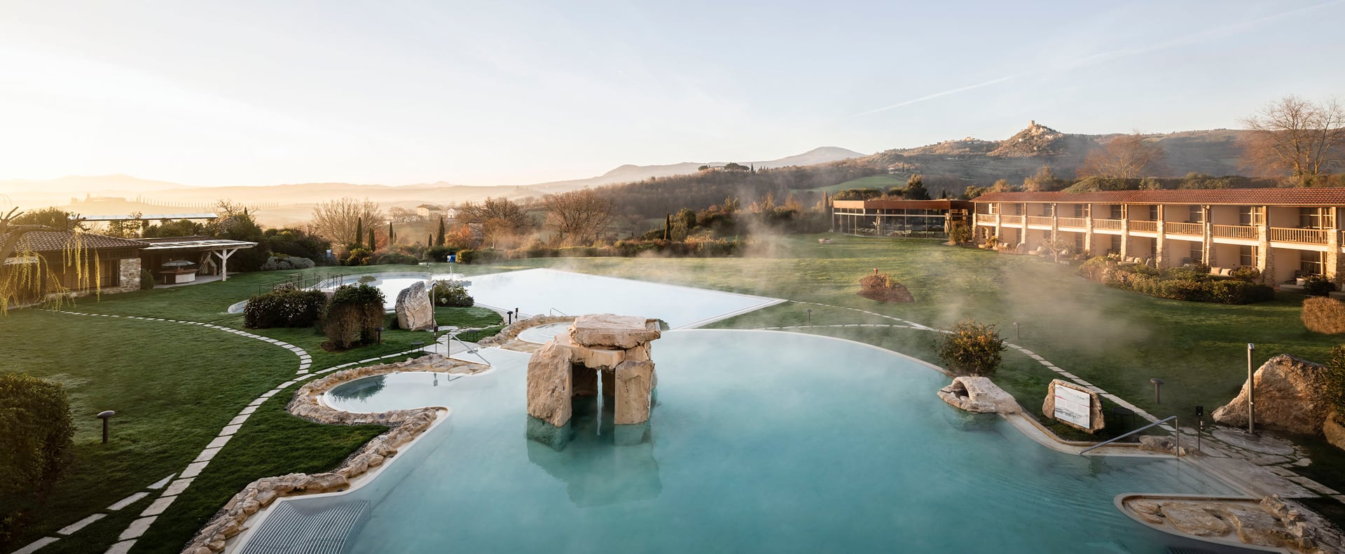 Aerial drone view of Adler Spa Resort Thermae set in the Val d'Orcia landscape, Tuscany