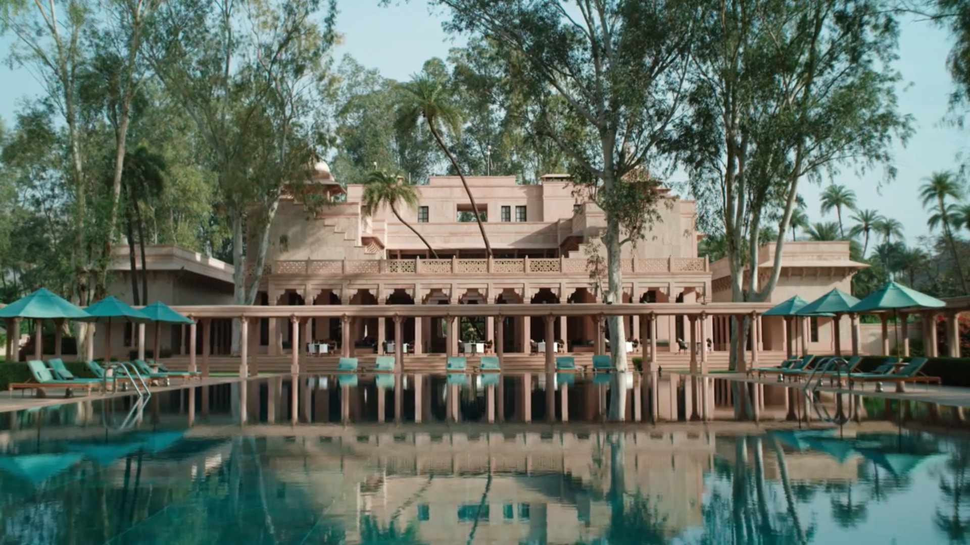 The thirty-three metre pool at Amanbagh, set in the walled palm garden in the Ajabgarh valley, Rajasthan