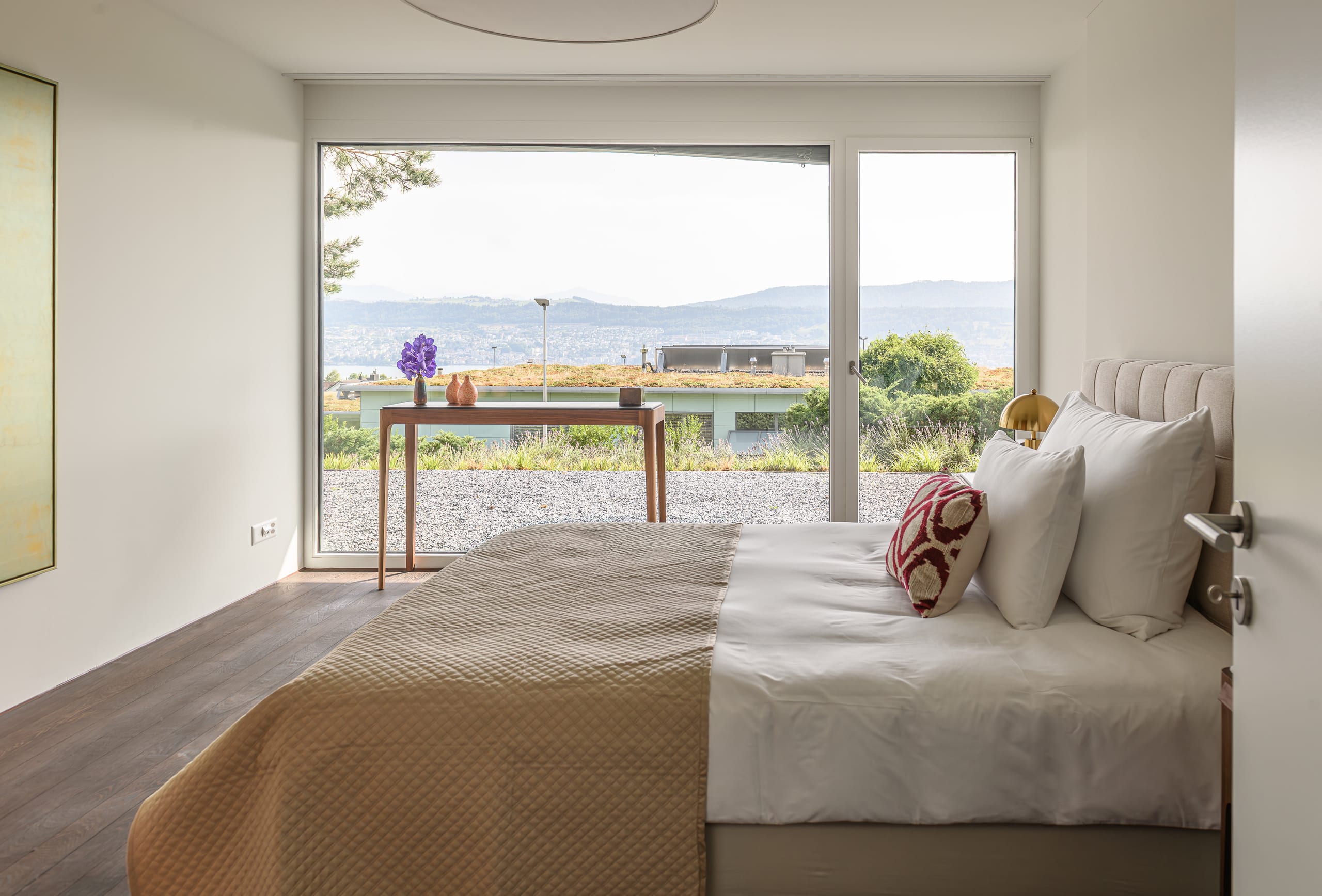 Villa Prima master bedroom at Küsnacht Practice — private rehab villa on Zurich Gold Coast