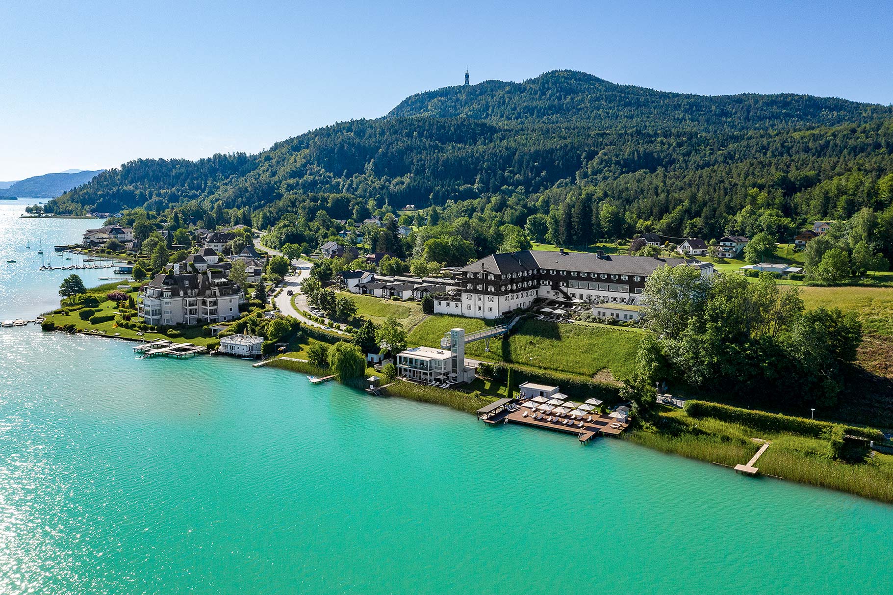 A drone view of the Original Mayr medical resort and the lake in front of it